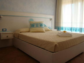Bella casa con giardino a 10 minuti dal mare Aglientu